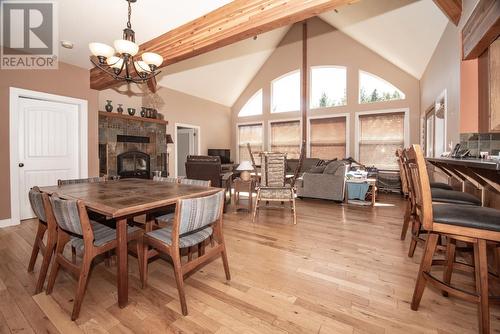 609 Wild Rose Drive, Merritt, BC - Indoor Photo Showing Dining Room With Fireplace