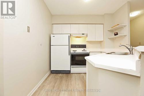 302 - 25 Grenville Street, Toronto, ON - Indoor Photo Showing Kitchen With Double Sink