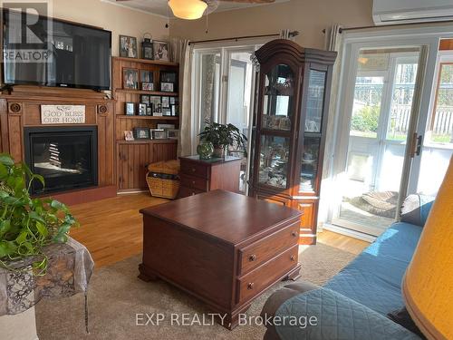 1 Bells Park Road, Wasaga Beach, ON - Indoor Photo Showing Living Room With Fireplace