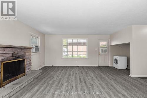 138 Peel Street, Barrie, ON - Indoor Photo Showing Other Room With Fireplace