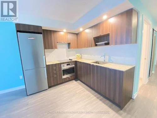 410 - 225 Village Green Square, Toronto, ON - Indoor Photo Showing Kitchen With Upgraded Kitchen