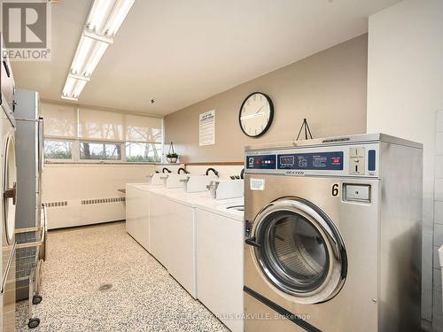 704 - 212 Kerr Street, Oakville, ON - Indoor Photo Showing Laundry Room