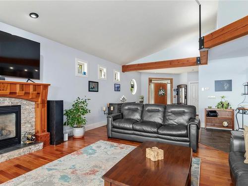 580 Island Hwy, Campbell River, BC - Indoor Photo Showing Living Room With Fireplace