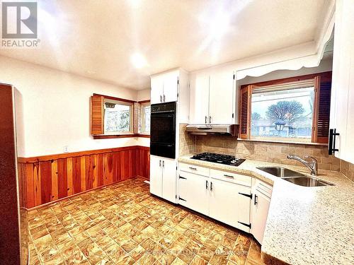 27 Willow Park Drive, Whitby, ON - Indoor Photo Showing Kitchen With Double Sink