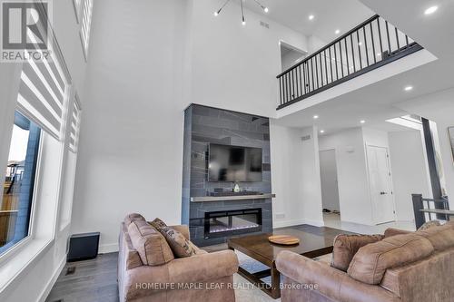 988 Trailsway Avenue, London, ON - Indoor Photo Showing Living Room With Fireplace