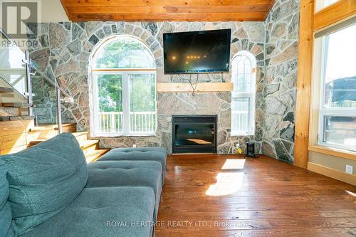 15 Lake Street, Kearney, ON - Indoor Photo Showing Living Room With Fireplace