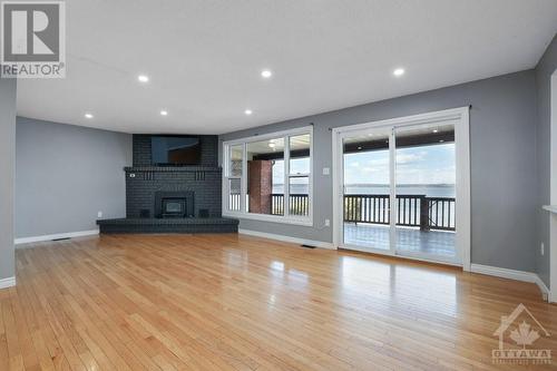 1183 Burns Drive, Pembroke, ON - Indoor Photo Showing Living Room With Fireplace