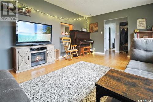 312 3Rd Avenue Se, Swift Current, SK - Indoor Photo Showing Living Room With Fireplace