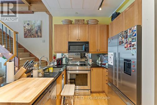 209 - 781 King Street W, Toronto, ON - Indoor Photo Showing Kitchen With Double Sink