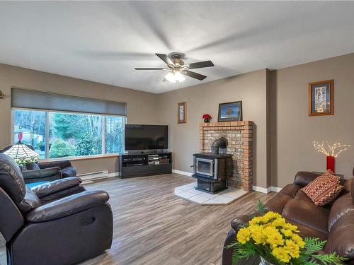 4199 Enquist Rd, Campbell River, BC - Indoor Photo Showing Living Room With Fireplace
