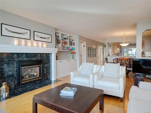 8-9901 Third St, Sidney, BC - Indoor Photo Showing Living Room With Fireplace