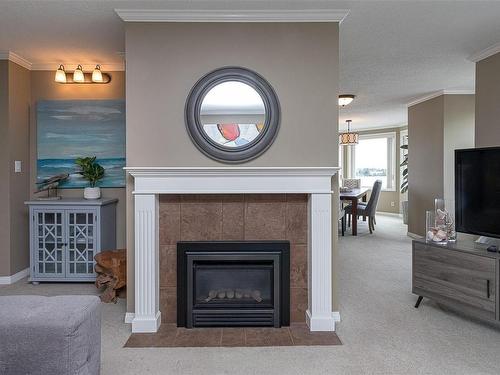 305-11 Cooperage Pl, Victoria, BC - Indoor Photo Showing Living Room With Fireplace