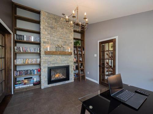 Library - 868 Rue Des Abbés-Primeau, Boucherville, QC - Indoor Photo Showing Other Room With Fireplace