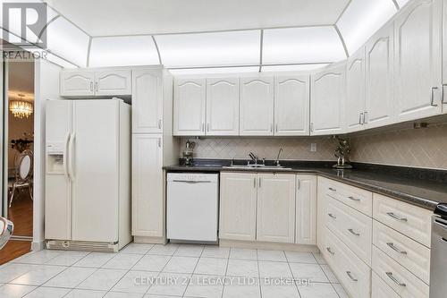 439 - 25 Bamburgh Circle, Toronto, ON - Indoor Photo Showing Kitchen With Double Sink