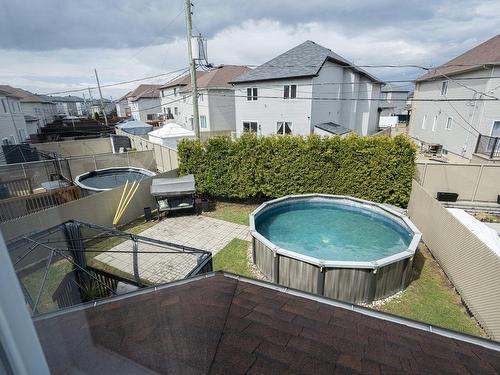 Backyard - 4955 Rue Cherrier, Laval (Chomedey), QC - Outdoor With Above Ground Pool