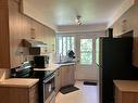 Kitchen - 5 7E Rue, Montréal (Pierrefonds-Roxboro), QC  - Indoor Photo Showing Kitchen With Double Sink 