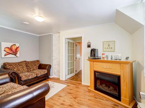 Salon - 1196 Rue De La Pisciculture, Mont-Blanc, QC - Indoor Photo Showing Living Room With Fireplace