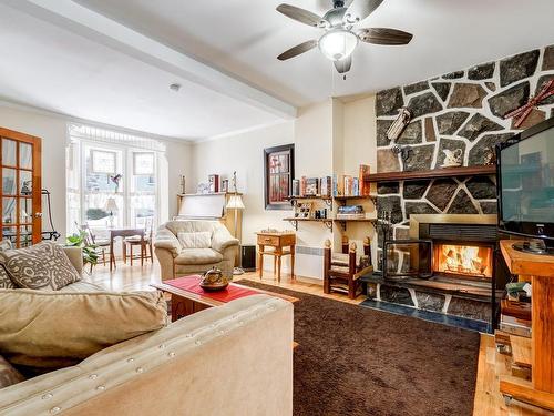 Living room - 1196 Rue De La Pisciculture, Mont-Blanc, QC - Indoor Photo Showing Living Room With Fireplace