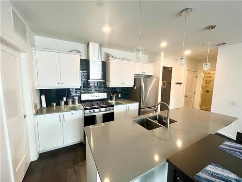 quartz counters - 38 Harbour Street|Unit #206, Port Dover, ON - Indoor Photo Showing Kitchen With Double Sink