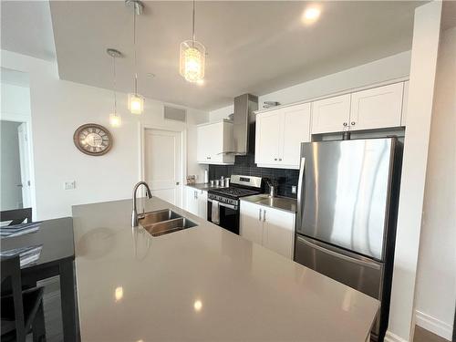 kitchen w/ s/s appliances - 38 Harbour Street|Unit #206, Port Dover, ON - Indoor Photo Showing Kitchen With Double Sink With Upgraded Kitchen