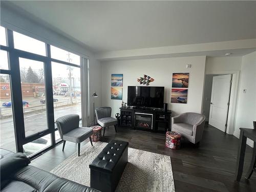 floor to ceiling windows and 9ft ceilings - 38 Harbour Street|Unit #206, Port Dover, ON - Indoor Photo Showing Living Room
