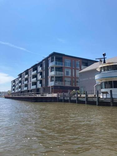 carefree condo living - 38 Harbour Street|Unit #206, Port Dover, ON - Outdoor With Body Of Water With Facade