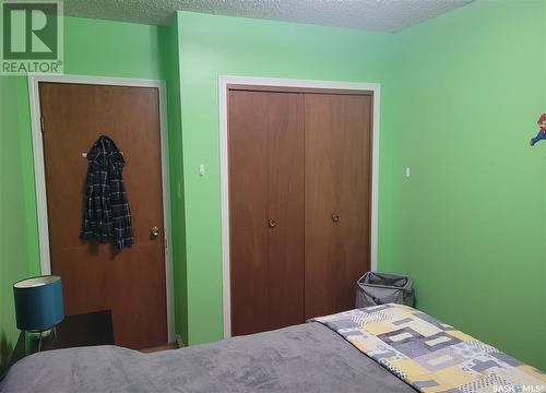 709 4Th Avenue, Raymore, SK - Indoor Photo Showing Bedroom