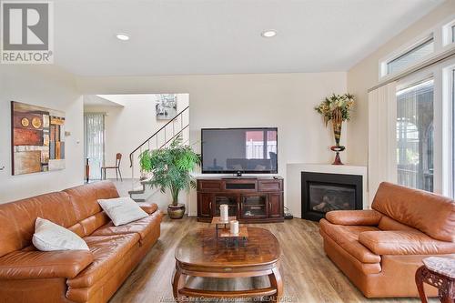 9234 St. Clair Road, Stoney Point, ON - Indoor Photo Showing Living Room With Fireplace