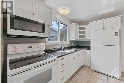 2076 St Laurent Boulevard, Ottawa, ON - Indoor Photo Showing Kitchen With Double Sink