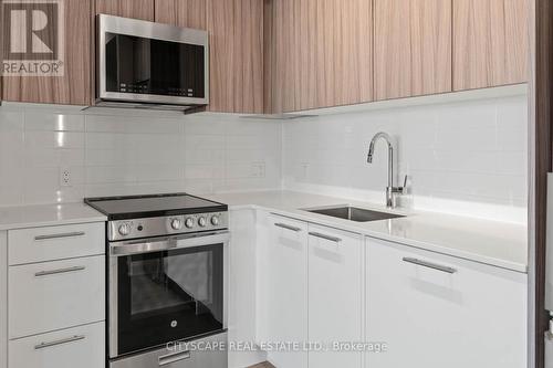 706 - 225 Veterans Drive, Brampton, ON - Indoor Photo Showing Kitchen With Upgraded Kitchen