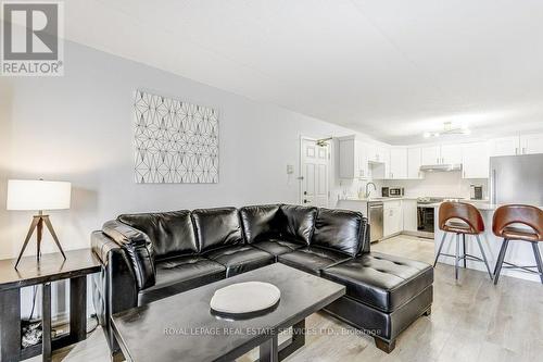 104 - 4005 Kilmer Drive, Burlington, ON - Indoor Photo Showing Living Room