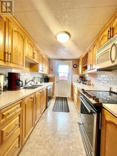 18 Lamaline Road, Fortune, NL - Indoor Photo Showing Kitchen With Double Sink