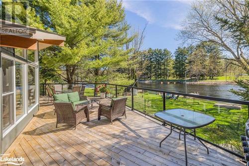 1687 Peninsula Point Road, Severn Bridge, ON - Outdoor With Body Of Water With Deck Patio Veranda