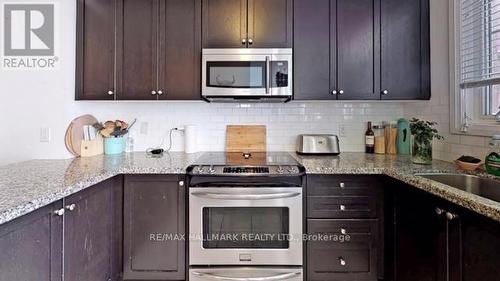 24 Raffeix Lane, Toronto, ON - Indoor Photo Showing Kitchen With Upgraded Kitchen