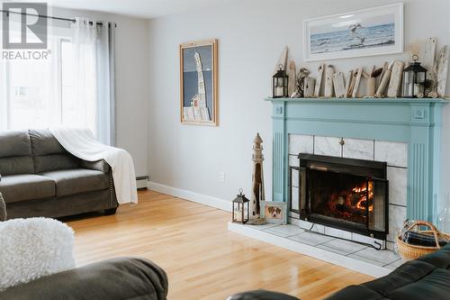 27 Griffin Place, Gander, NL - Indoor Photo Showing Living Room With Fireplace