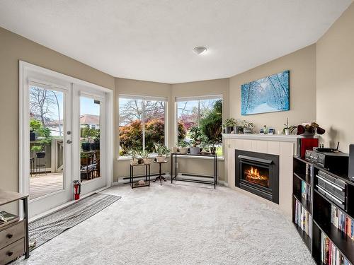102-1400 Tunner Dr, Courtenay, BC - Indoor Photo Showing Living Room With Fireplace