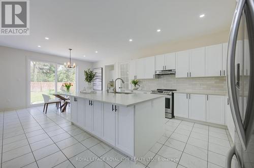 64 Harpin Way E, Centre Wellington, ON - Indoor Photo Showing Kitchen With Upgraded Kitchen