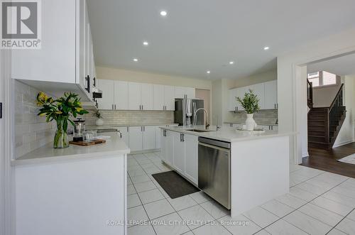 64 Harpin Way E, Centre Wellington, ON - Indoor Photo Showing Kitchen With Upgraded Kitchen
