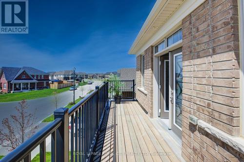 64 Harpin Way E, Centre Wellington, ON - Outdoor With Balcony With Exterior