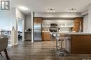 219 225 Maningas Bend, Saskatoon, SK  - Indoor Photo Showing Kitchen With Stainless Steel Kitchen 