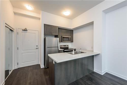 450 Dundas Street E|Unit #114, Waterdown, ON - Indoor Photo Showing Kitchen With Stainless Steel Kitchen With Double Sink
