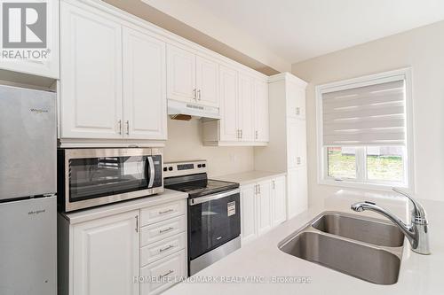 62 Dotchson Avenue, Caledon, ON - Indoor Photo Showing Kitchen With Double Sink