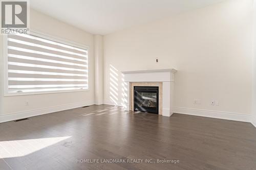 62 Dotchson Avenue, Caledon, ON - Indoor Photo Showing Living Room With Fireplace