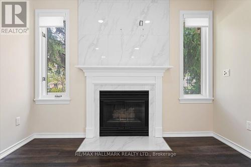 1 - 1616 Pelham Street, Pelham, ON - Indoor Photo Showing Living Room With Fireplace
