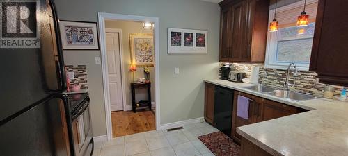 11-15 Southside Road, Port Aux Bras, NL - Indoor Photo Showing Kitchen With Double Sink