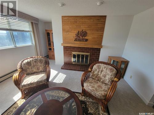 711 351 Saguenay Drive, Saskatoon, SK - Indoor Photo Showing Living Room With Fireplace