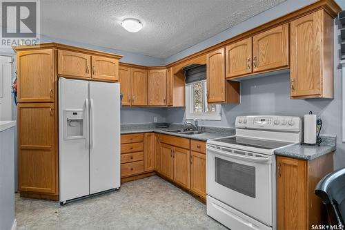 479 24Th Street E, Prince Albert, SK - Indoor Photo Showing Kitchen With Double Sink