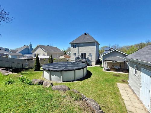 Cour - 9 Rue Bernard, Saint-André-D'Argenteuil, QC - Outdoor With Above Ground Pool With Backyard