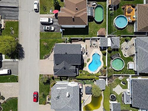 Aerial photo - 358 Rue Des Orioles, Terrebonne (Lachenaie), QC - Outdoor With Above Ground Pool