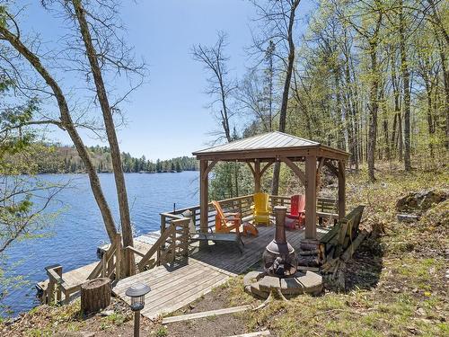 ExtÃ©rieur - 145 Ch. L'Heureux, Lac-Sainte-Marie, QC - Outdoor With Body Of Water With Deck Patio Veranda